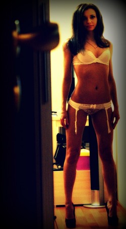 Karina Fortis from MyFreeCams in lingerie and high heels