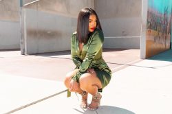 Lori Harvey in green dress