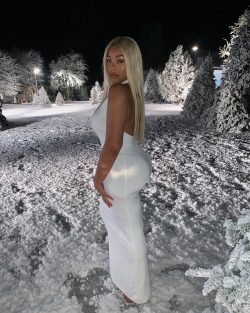 Jordyn Woods in skintight white dress