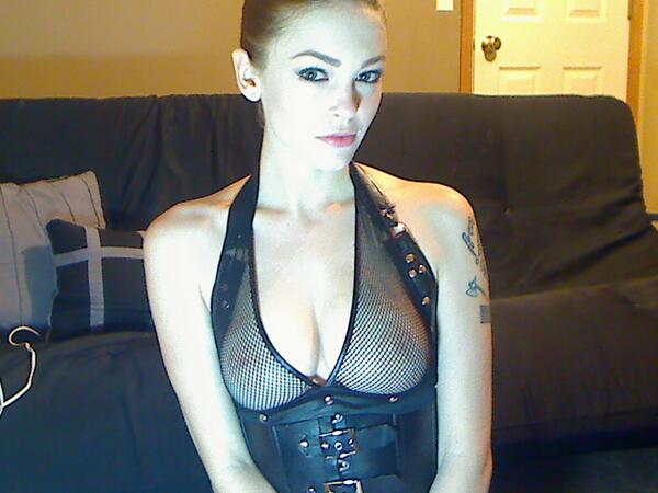 Bree Daniels on her Streamate webcam wearing a fishnet top