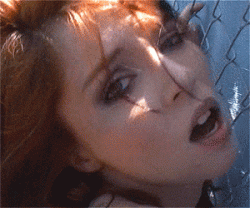GIF of redhead gets fucked against fence | Wicked