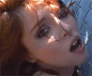 GIF of redhead gets fucked against fence | Wicked