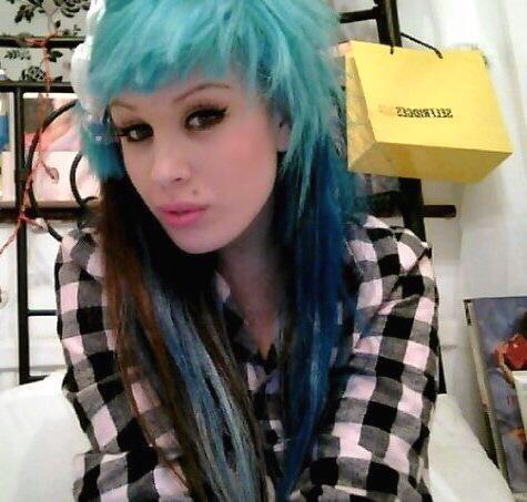 older photo of Lily Madison with dyed blue hair